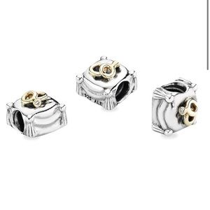 Pandora two tone wedding rings on pillow charm, real diamond
